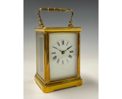 A late 19th century Couaillet Freres lacquered brass carriage timepiece, Roman numerals on white rectangular clock dial, five