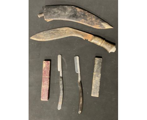 A mid 20th century Kukri knife, the blade punch decorated and marked India, 42cm long; a straight razor, G. Gadman &amp; Sons