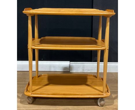 An Ercol beech and elm three tier trolley, 76.5cm high, 71.5cm wide, 46cm deep 
