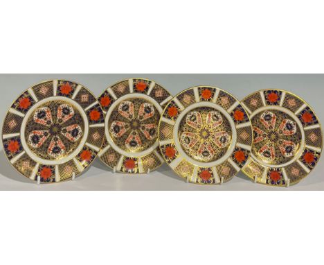 A pair of Royal Crown Derby Imari palette 1128 pattern tea plates, first quality; two others, seconds (4) 