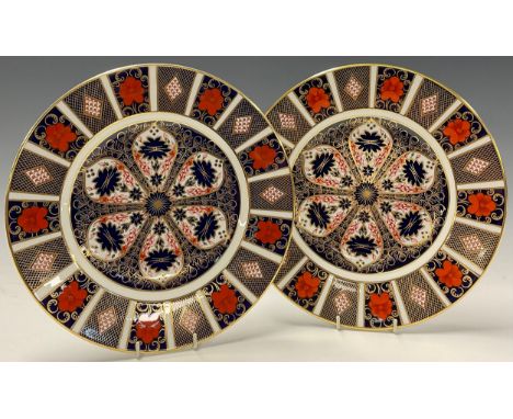 A pair of Royal Crown Derby Imari palette 1128 pattern dinner plates, 27cm diameter, both first quality 