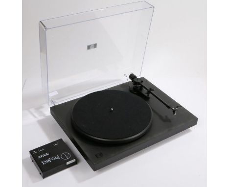 Pro-Ject Debut II Turntable in matte black, together with Pro-Ject Phono Box and manual.