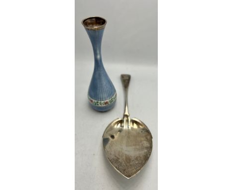 A white metal guilloche enamel vase 14cm h together with a sterling silver cake/pie slice. Total weight 180gm.