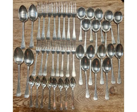 A canteen of hallmarked silver cutlery in an oak cabinet comprising 8 soup spoons, 8 dessert spoons, 8 teaspoons, 8 table for