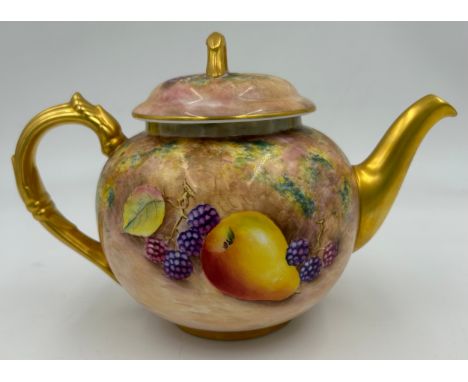 A Royal Worcester teapot hand painted with fruit and leaves signed Leaman. approx. 13.5cm h.