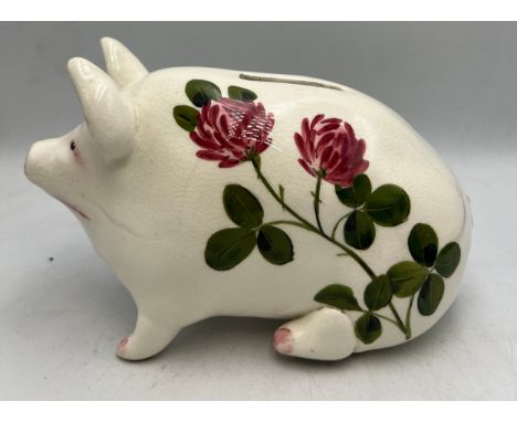 A Wemyss Plichta pig money box. 17cm l.