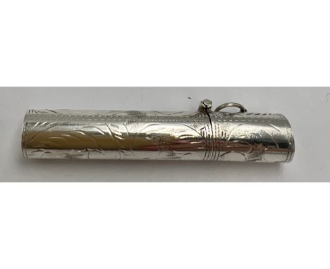 A sterling silver needle case with etched decoration on a suspension ring. 6.5cm l.