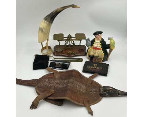 A miscellany of items to include an alligator handbag, a horn carved in the shape of a bird 30cm, Royal Doulton Long John Sil
