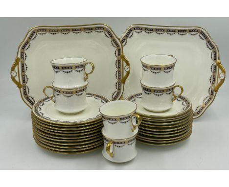 Royal Cauldon China part tea service in blue and gold comprising of 2 x cake plates, 11 x small plates 17cm, 11 x saucers 14c