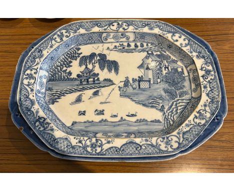 An early 19th century blue and white transfer printed large Spode Willow platter, c. 1810. Together with a large platter in t