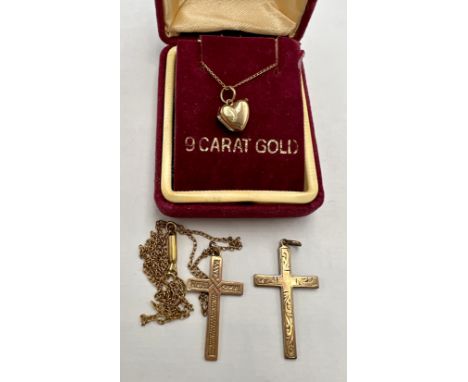 Nine carat gold crucifix on 9 carat gold chain, a 9 carat gold heart shaped locket and chain, total weight 3.5gm, together wi