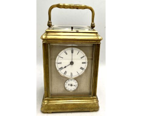 A grand sonnerie carriage clock with gorge case, repeat and alarm, striking on two gongs. The back plate inscribed Payne &amp