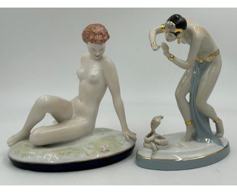 Two Royal Dux Art Deco figures, a young woman seated on an oval naturalistic base with cobalt blue edge 22cm h x 20cm w, impr