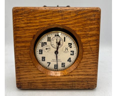Waltham ship watch/chronometer in fitted oak case. 12cm x 12cm.