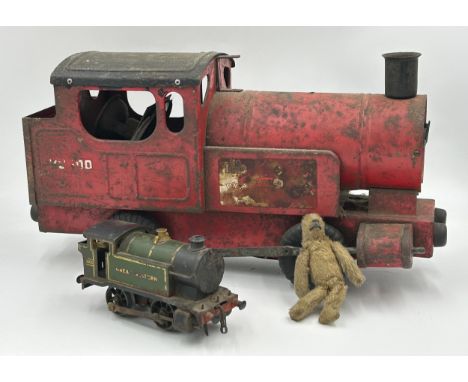 A large tin plate pull a long Tri-ang Puff Puff Train with original rubber tyres 44cm x 23cm, a Hornby '0' gauge clockwork Gr