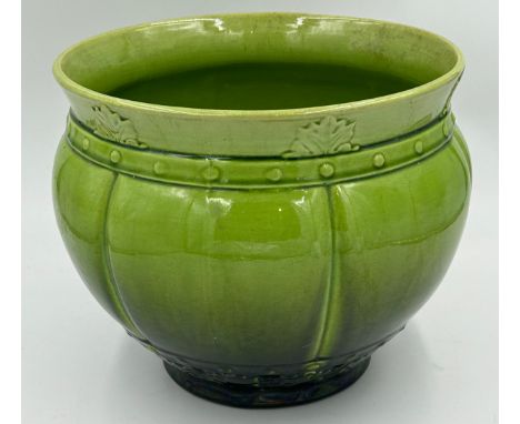A large green Jardinière Planter by Joseph Holdcroft with makers mark to base 'Holdcrofts Ltd Harrow' 28cm d x 25cm h.
