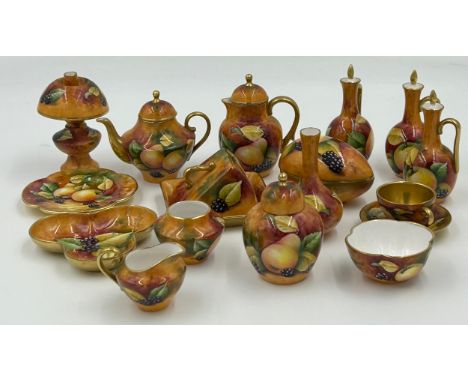 A collection of Caverswall miniature ceramics with fruit design all hand painted by D. Millar and signed. Includes, cheese di