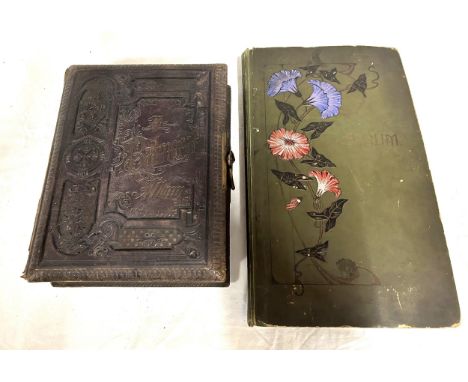 A late 19thC Balmoral Musical Album with metal clasp containing 42 photographs and working musical movement along with an Edw