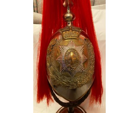 A fine and original Household Cavalry/Royal Horse Guards helmet. Complete with plume chin strap and roses.