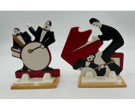 A pair of Wedgwood 'Age of Jazz' ceramic figures, Drummer and Pianist, 12cm high, limited edition, based on the Clarice Cliff