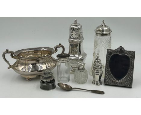 A collection of silver items to include twin handled footed bowl Joseph Gloster Birmingham 1923, sugar sifter 18cm S. J. Rose