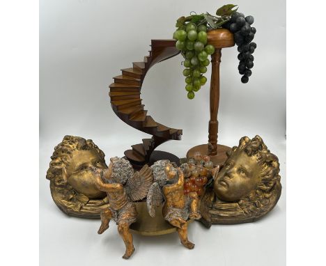 A collection of display items to include 2 bunches of glass grapes, a wooden hat stand 38.5cm h, a wooden spiral staircase 36