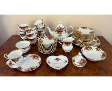 A quantity of Royal Albert Old Country Roses to include 10 x cups, 12 x saucers, 12 x tea plates 16cm, 6 x plates 21cm, 1 x l