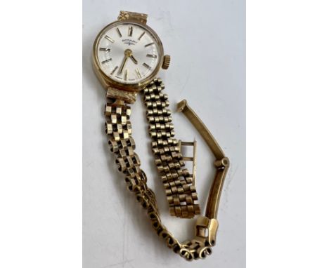A 9 carat gold ladies Rotary wristwatch on 9 carat gold strap. Total weight 14.6gm.