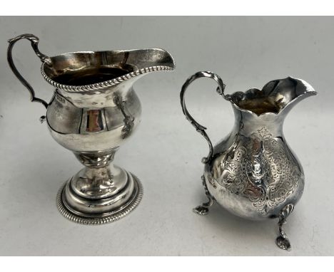 Two hallmarked silver jugs, Sheffield 1912, maker Henry Stratford Ltd and London 1868, maker Richard’s &amp; Brown. Total wei