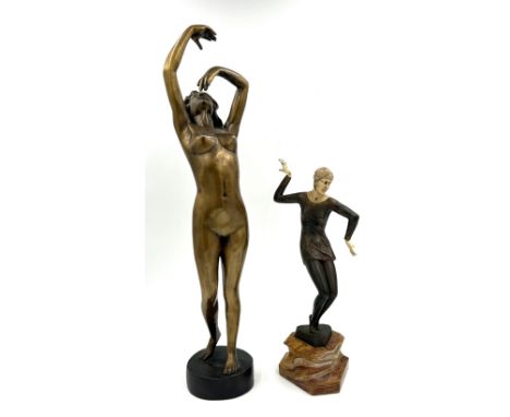 After Johann Ferdinand Preiss, an Art Deco style bronzed spelter and resin figure of a Charleston dancer, on a polished hards