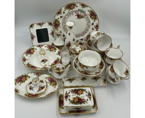 Royal Albert Old Country Roses first quality to include, 6x cups and saucers, 6x cake plates, candlestick holder, picture fra