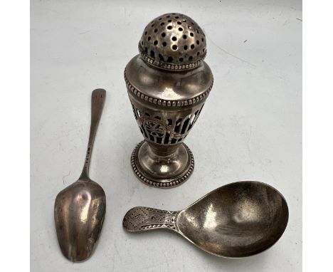 Hallmarked silver to include pepperette Sheffield 1776, caddy spoon London 1791, maker Thomas Nash II and a silver teaspoon.