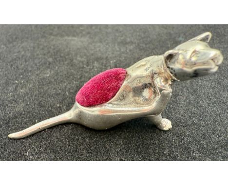 A scratching cat sterling silver pincushion. 6cm l.