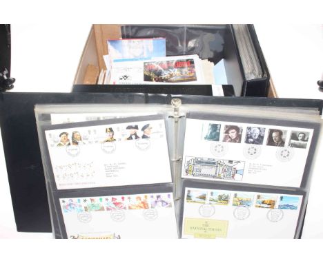 Large collection of Great Britain first day covers, presentation packs loose, in three albums