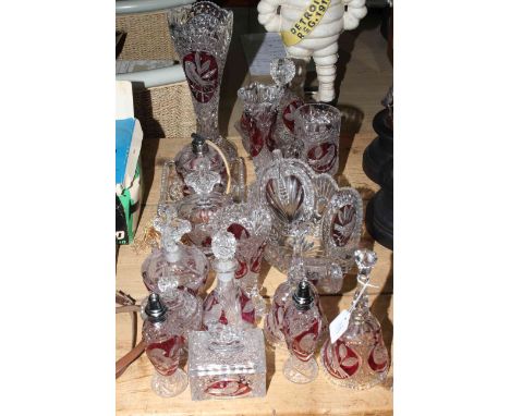 Collection of bird decorated ruby and clear glassware including vases, bells, dishes, trinket ware, etc