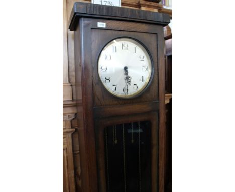A 1920/30's oak long case clock