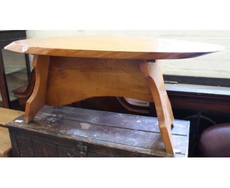 An occasional table made from a section of a tree trunk