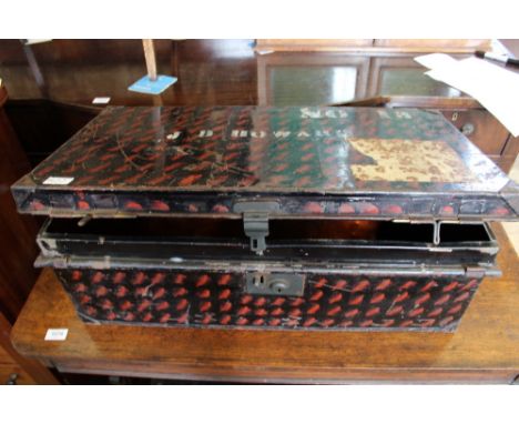 A vintage travelling trunk and black painted tin trunk