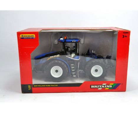 Britains 1/32 New Holland T9.565 Tractor. M in Box (Box has some slight nicotine staining.)