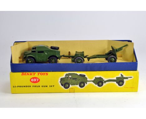 Dinky Toys No. 697 Military Field Gun Set comprising of quad tractor, ammunition trailer and field gun. NM in VG/E Box.