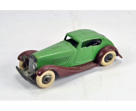 Dinky Toys No.24e Pre-war Streamlined Saloon. Mid-green body, purple chassis, white tyres. An already stunning example would 