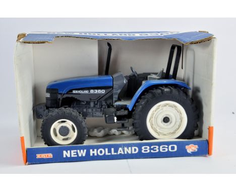Ertl 1/16 New Holland 8360 Tractor. E to NM in G Box.