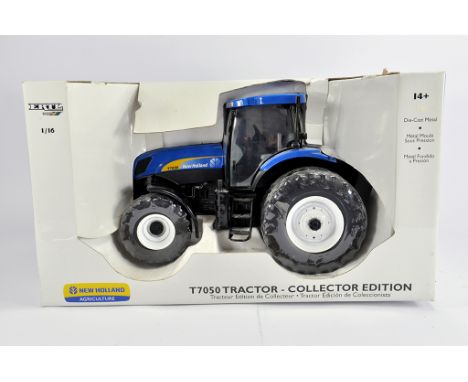 Ertl 1/16 New holland T7050 Tractor. Collectors Edition. NM to M in VG Box.