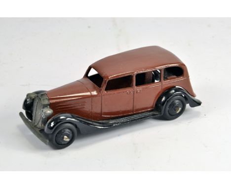 Dinky Toys No.30D Vauxhall Saloon. Brown body, black open chassis and ridged hubs. E/NM. Lovely example.