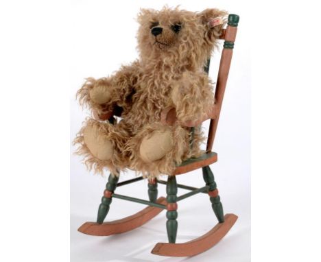 A STEIFF TEDDY BEAR AND A PAINTED WOOD ROCKING CHAIR, 46CM H