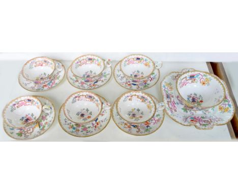 A STAFFORDSHIRE PORCELAIN CHINESE ROSE PATTERN TEA SERVICE, COMPRISING SIX CUPS AND SAUCERS, SLOP BASIN AND PLATE, SAUCER 17C