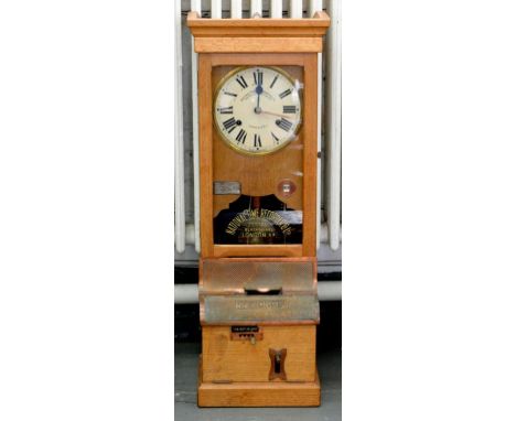 AN EARLY 20TH CENTURY NATIONAL TIME RECORDER IN A LIGHT OAK CASE, 118CM H