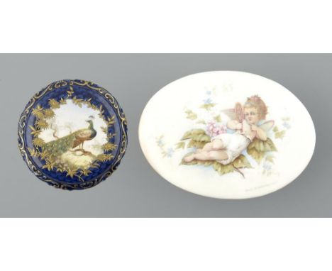A GRAINGER WORCESTER ROYAL BLUE GROUND BOX AND COVER, 1902, the cover decorated with a peacock in raised gilt frame, 10.5cm d