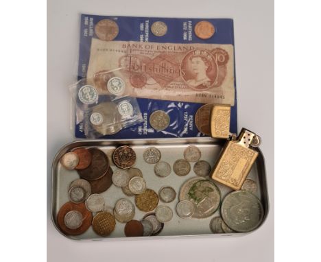 A selection of coins to include one penny, three pences, half crown, other coins, Queen Elizabeth 1977 coin in case, ten shil