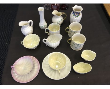 A selection of various Belleek to include tea cups and saucers, vases, jugs and bowls. IMPORTANT: Online viewing and bidding 